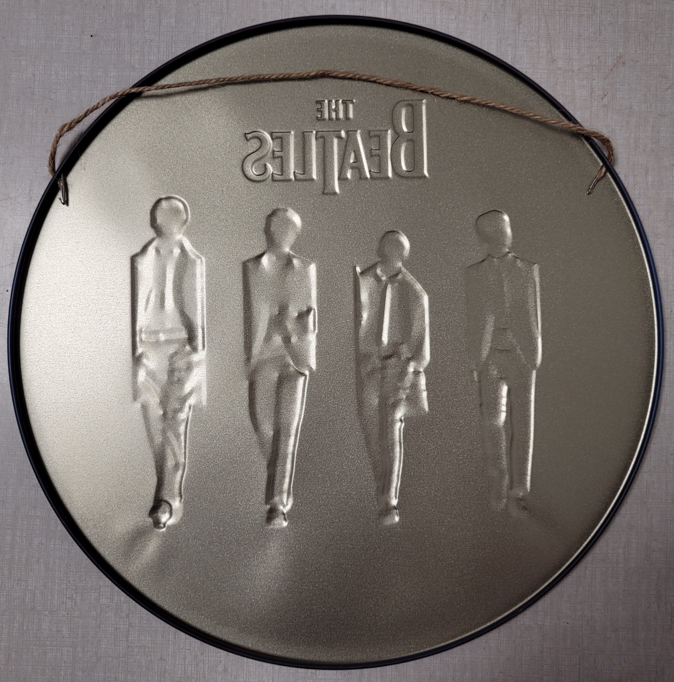 The Beatles rond relief reclamebord